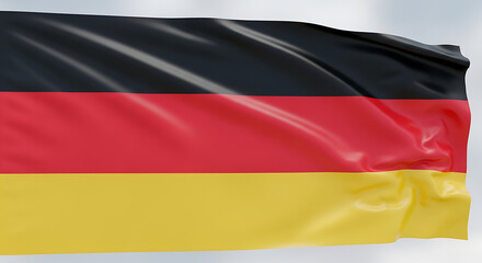 Fototapeta premium Flag with three horizontal stripes in black, red, and yellow, waving in the air. The fabric displays a shiny texture and slight folds, creating a dynamic motion effect