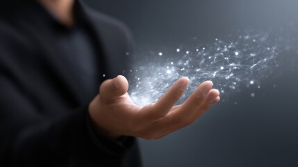 Businessman holding a luminous digital network symbolizing future technology and global connection