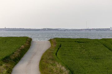 Nykobing Mors, Denmark A coastal country road leads to the Limfjord. © Alexander