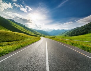 Naklejka premium empty road through lush green valley