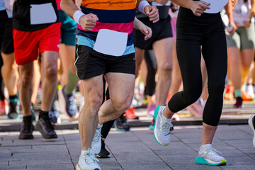 Large group of athletes running marathon