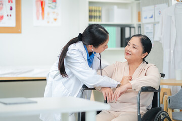 experienced female medical professional explains test results to a female patient during a clinic consultation. reviewing reports and discussing diagnosis and treatment options.compassionate care