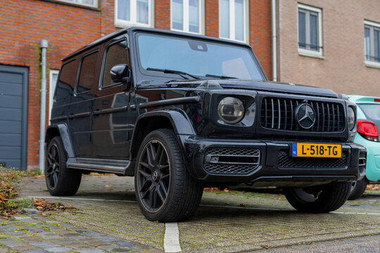 Hoorn, Netherlands. 12-4-2024. Black Mercedes-Benz G-Class AMG SUV parked in residential area