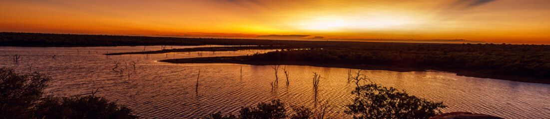 Panoramic sunset view of Mopani lake in Kruger National park, South Africa