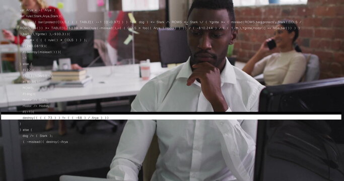 Focusing man wearing white shirt coding at open plan office, with coffee mug and smartphone - Powered by Adobe