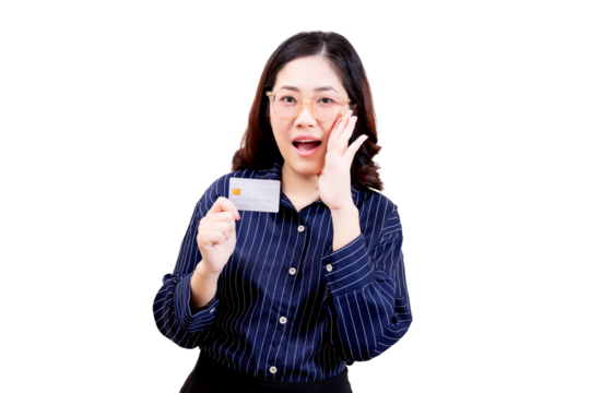 Asian young beautiful woman wearing glasses and a striped shirt holds a credit card with an excited expression, suggesting surprise or enthusiasm.