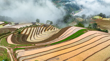 Water season flows into terraced fields and rice planting begins in Mu Cang Chai, Yen Bai. Photo...