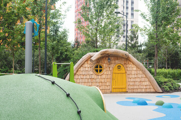 Playground with Wooden Teepees and Climbing Structures