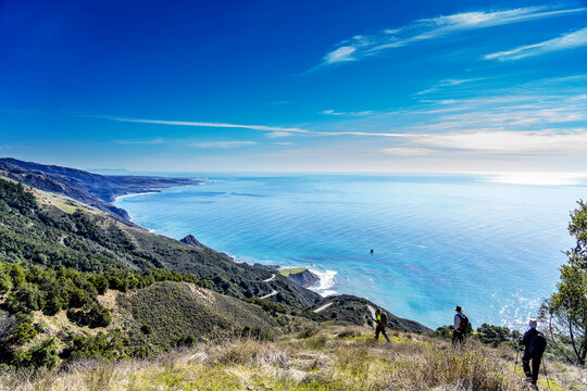 Hiking down the mountain with the ocean and coastline