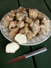 Closeup of the edible tubers of sunchoke or Jerusalem artichoke (Helianthus annuus)