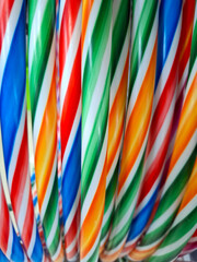 Colorful bright hoops displayed in a vibrant store setting attract attention during a festive...