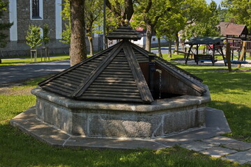 Public fountain in Prichovice near Korenov in Czech Republic, Europe
