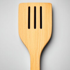 Wooden Kitchen Spatula with Slotted Surface on Gray Background