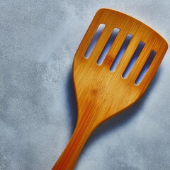 Wooden Cooking Spatula on Gray Marble Background for Culinary Use