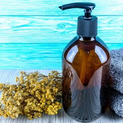 Stylish Brown Pump Bottle with Dried Flowers and Soft Towel