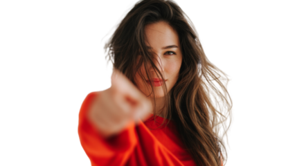 A woman with long brown hair is wearing a red shirt and pointing to the camera