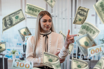 Pretty caucasian woman celebrating winning big money, flying dollar bills from the air.