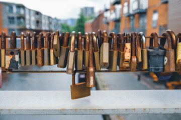 Love locks tradition on an urban bridge