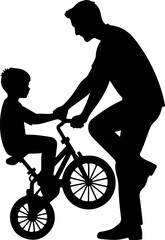 silhouette of a man with a bicycle and his son