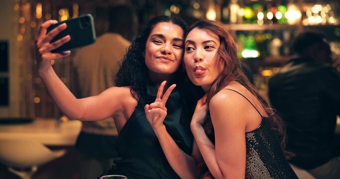 Selfie, peace sign and party with women at night club for social media, reunion and disco event. Happiness, celebration and photography with people at bar for culture, weekend and new years eve