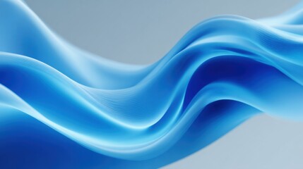 Fototapeta premium Soft blue fabric creates elegant, flowing waves against a calm, light backdrop. The movement suggests tranquility and harmony, perfect for a minimalist setting.