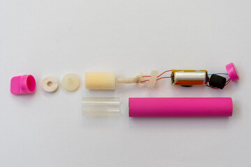 Electronic vaporiser disassembled - a view of the individual parts of a vaping device.