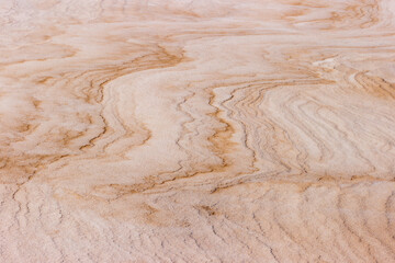An abstract image is created from the drifting snow and sand over the beach at Harrington Beach State Park, Belgium, Wisconsin in ,mid-February