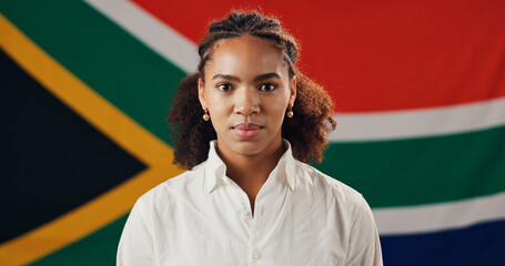 Portrait, woman and South African flag for national pride, heritage and culture with support. Face,...