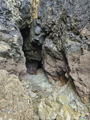 Coastline at the foot of cliffs overlooking the ocean in Ireland