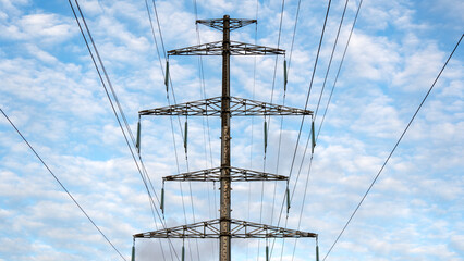 High-voltage power lines in the background of sunset or dawn