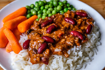 Mexican Style Chilli Con Carne With Carrots And Garden Peas