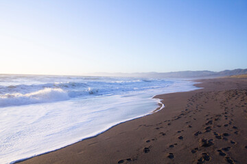 footprints on the beach