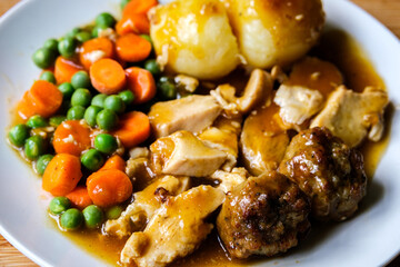 Traditional British Favourite Roast Chicken Sunday Meal With Vegetables And Stuffing