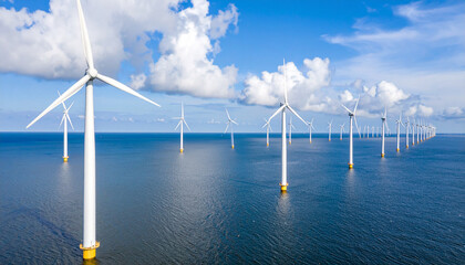 Offshore Windmill Park Under Blue Sky with Clouds in Open Ocean View