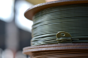 Plastic wire for 3d printer. Spools of plastic threads for printing on 3D printer. Spool of filament. Plastic for 3D printer. Components for 3D printing. New modern additive printing FDM technology