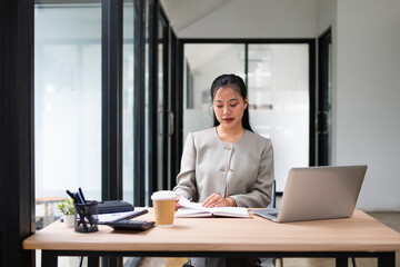Businessman working in open room, front view