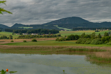 Cloudy morning sunrise with water of lake Wallersee Austria