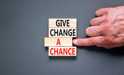 Give change a chance symbol. Concept words phrase Give change a chance on beautiful wooden blocks....