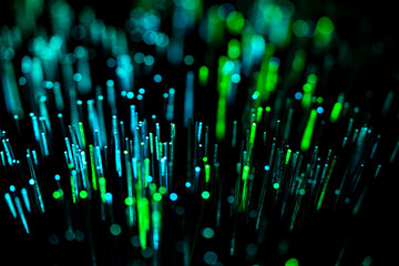 Optical fiber strands illuminated with vibrant colors