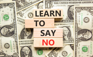 Learn to say no symbol. Concept words phrase Learn to say no on beautiful wooden blocks. Dollar...