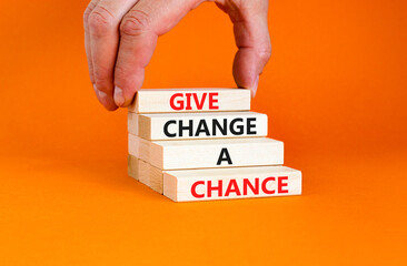 Give change a chance symbol. Concept words phrase Give change a chance on beautiful wooden blocks....