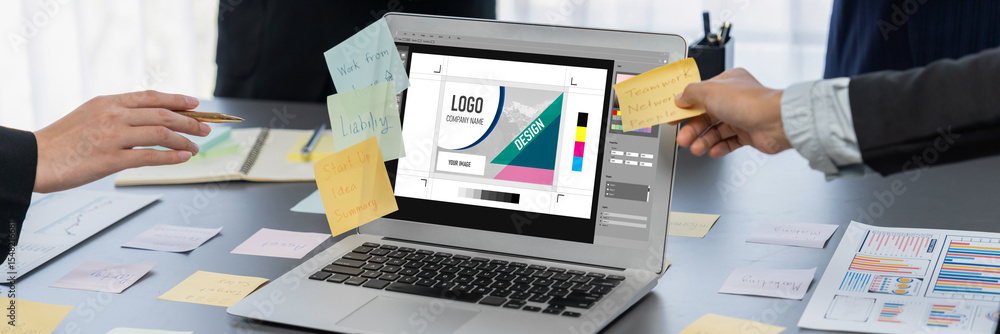 Aufkleber graphic designer software for modern design of web page and commercial brisk ads showing on the comp