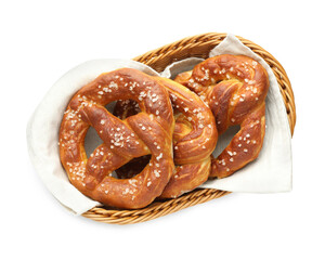 Tasty pretzels with salt in wicker basket isolated on white, top view