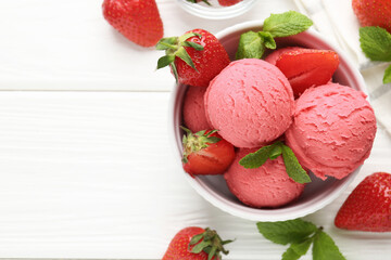 Tasty sorbet with strawberries and mint served on white wooden table, flat lay. Space for text
