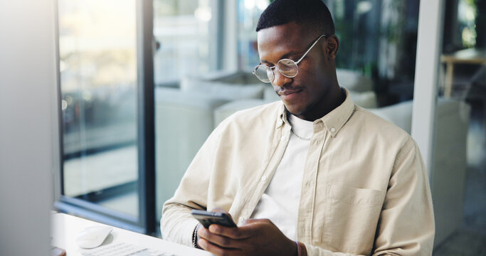 Businessman, texting and chatting with phone at office for communication, research or email. Man, employee or creative designer typing on mobile smartphone app for social media or news at workplace