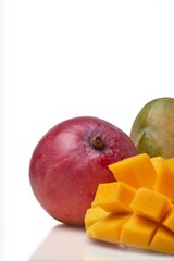 Ripe mango depicted with vibrant, cubed flesh alongside its whole fruit on a white background.