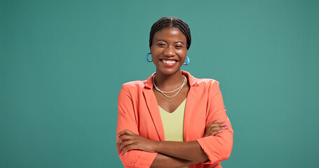 Black woman, portrait and business owner in studio with confidence, fashion designer and happy. Entrepreneur, arms crossed and smile on green background space for about us, brand clothing and startup