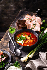 Traditional Ukrainian borsch with sour cream