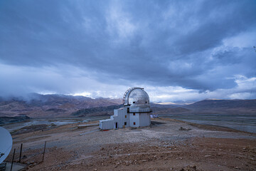 The Indian Astronomical Observatory in Hanle, Ladakh, sits under a vast blue sky, where white...