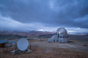 The Indian Astronomical Observatory in Hanle, Ladakh, sits under a vast blue sky, where white...